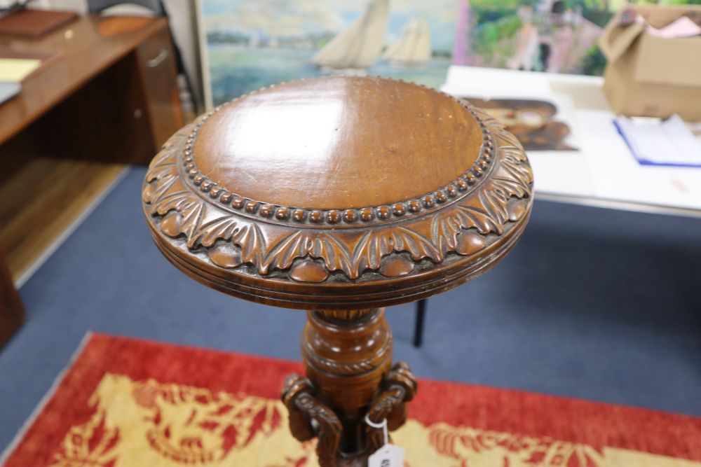 A Georgian style mahogany torchere, height 148cm